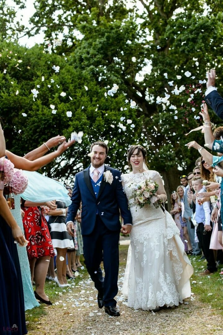 throwing sonfetti at a dorset wedding