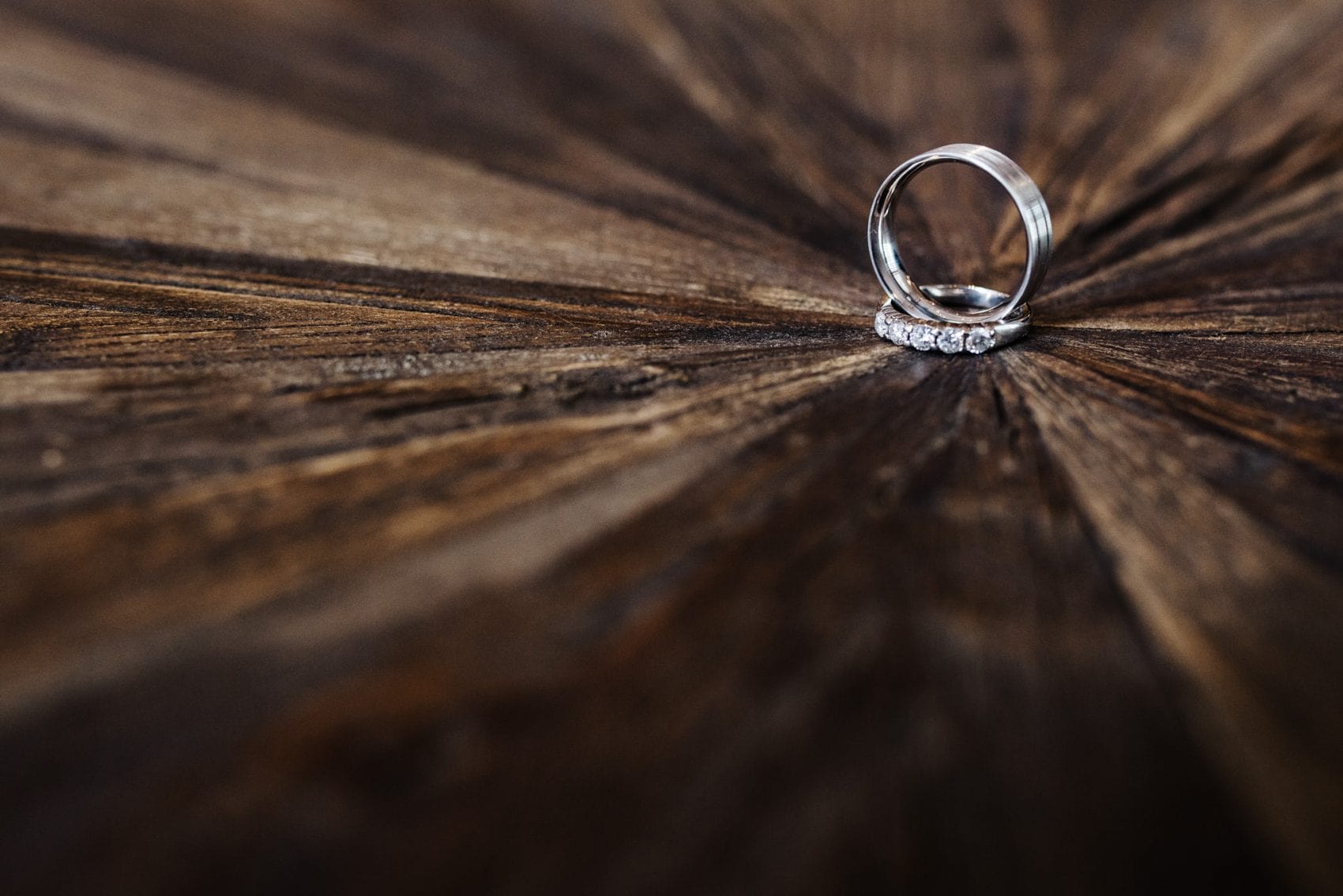 Wedding ring detail on wood