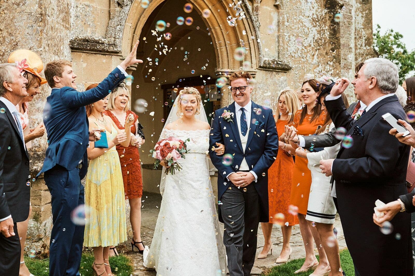 Bubbles and confetti - North Cadbury Court Wedding photographer