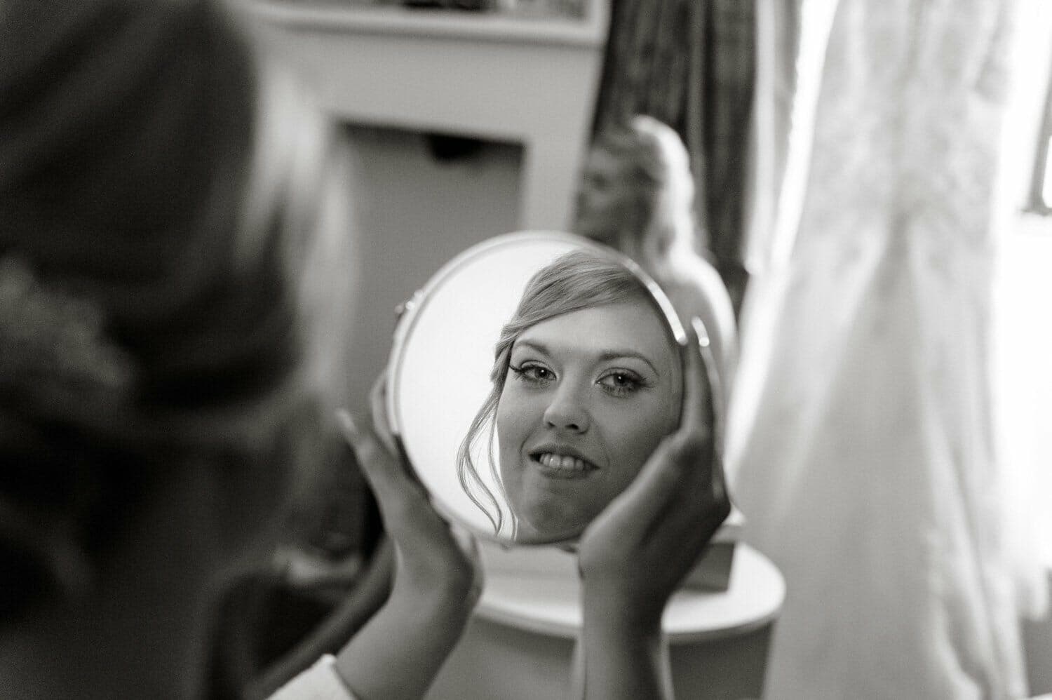 Brympton House wedding - bride in mirror