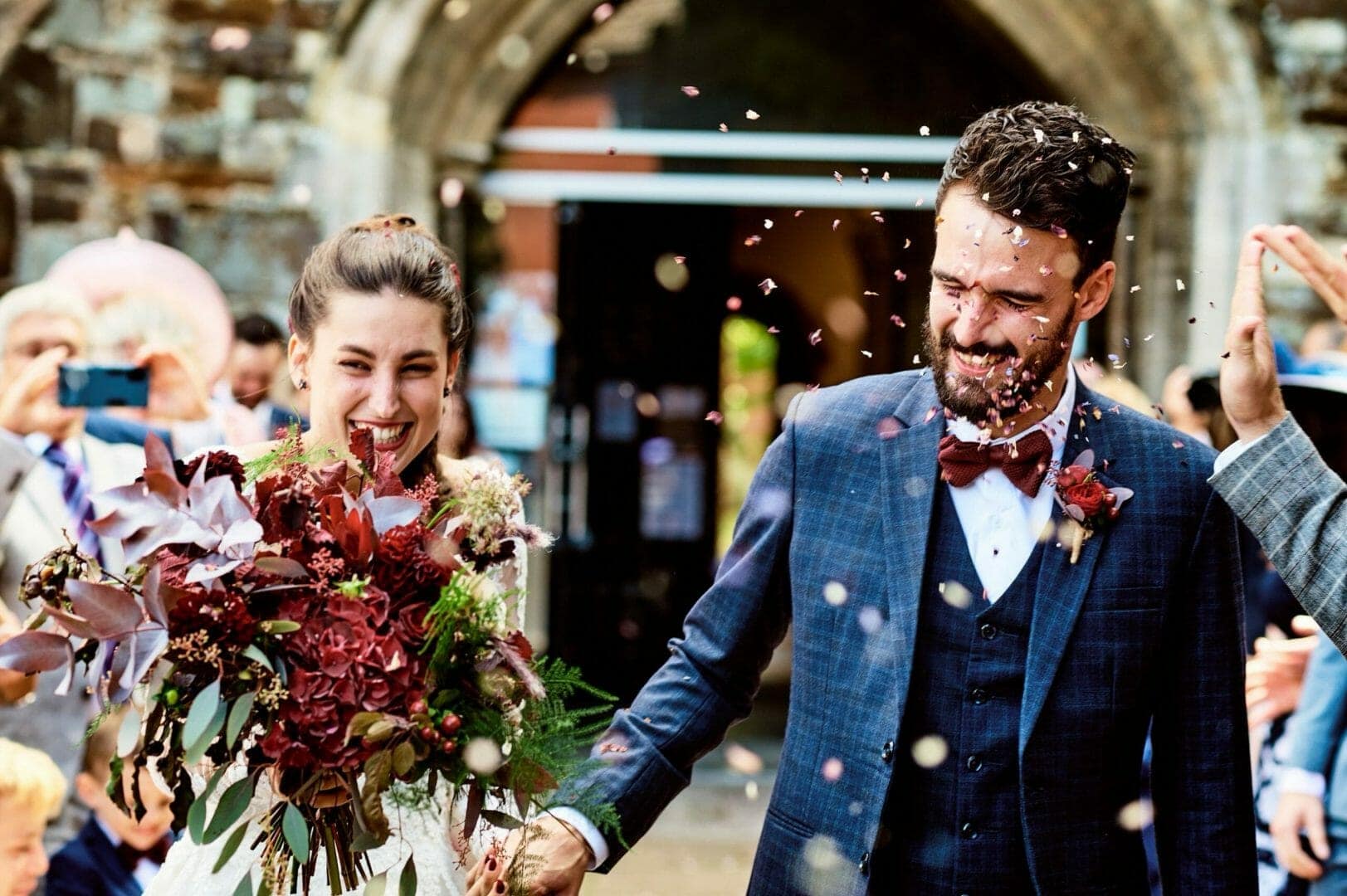 Groom gets a face full of confetti at Wimborne minster