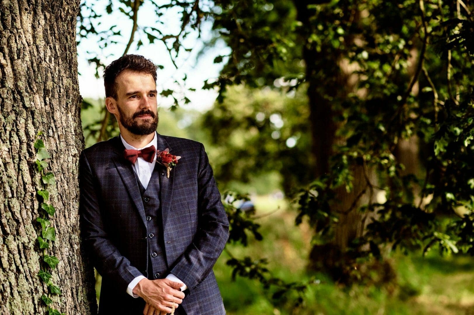 Groom in blue check suit