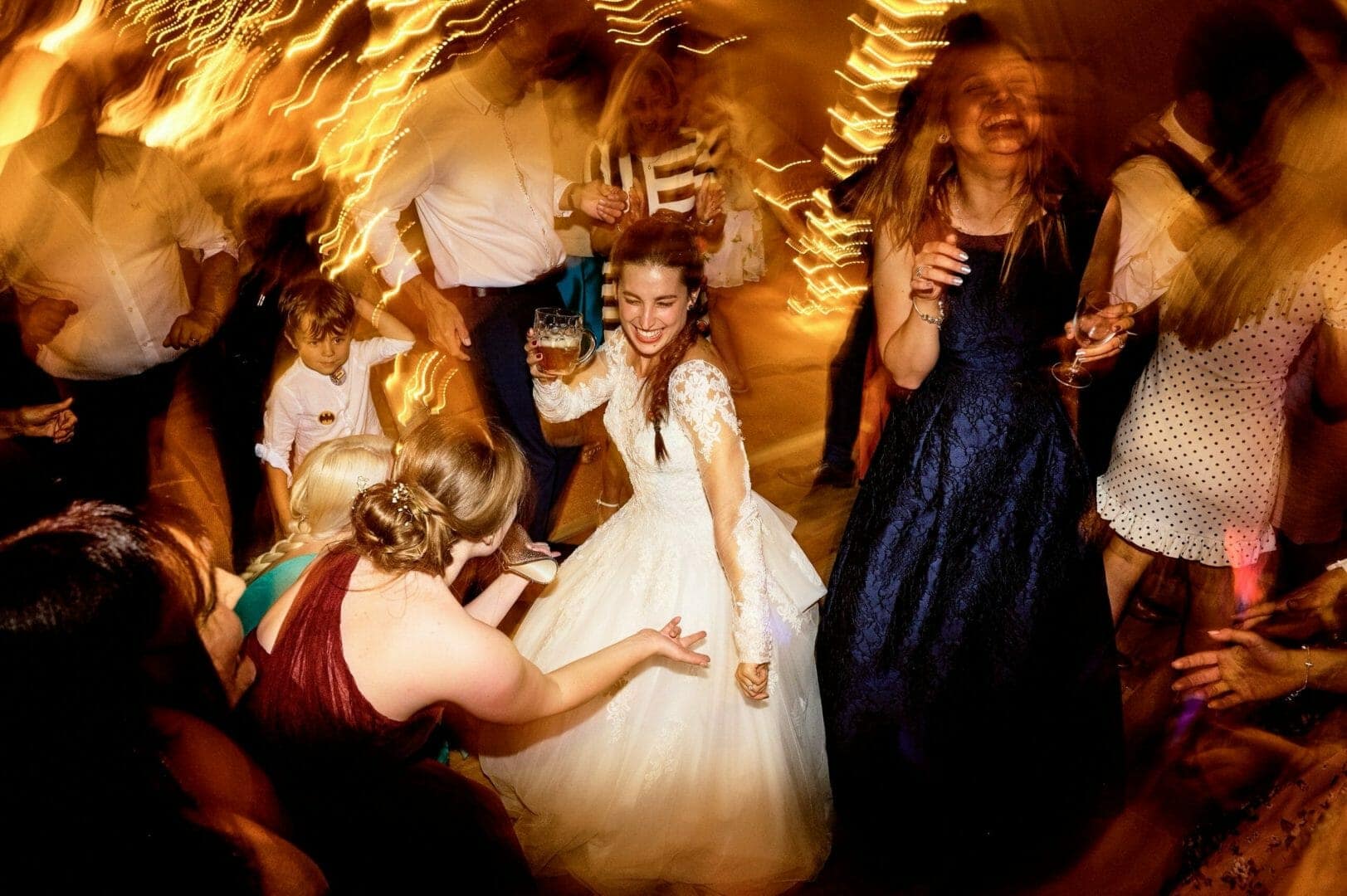 Bride dancing at tipi wedding