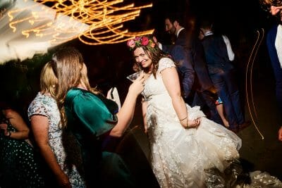 Bride looking mischeivious at Silchester Farm wedding