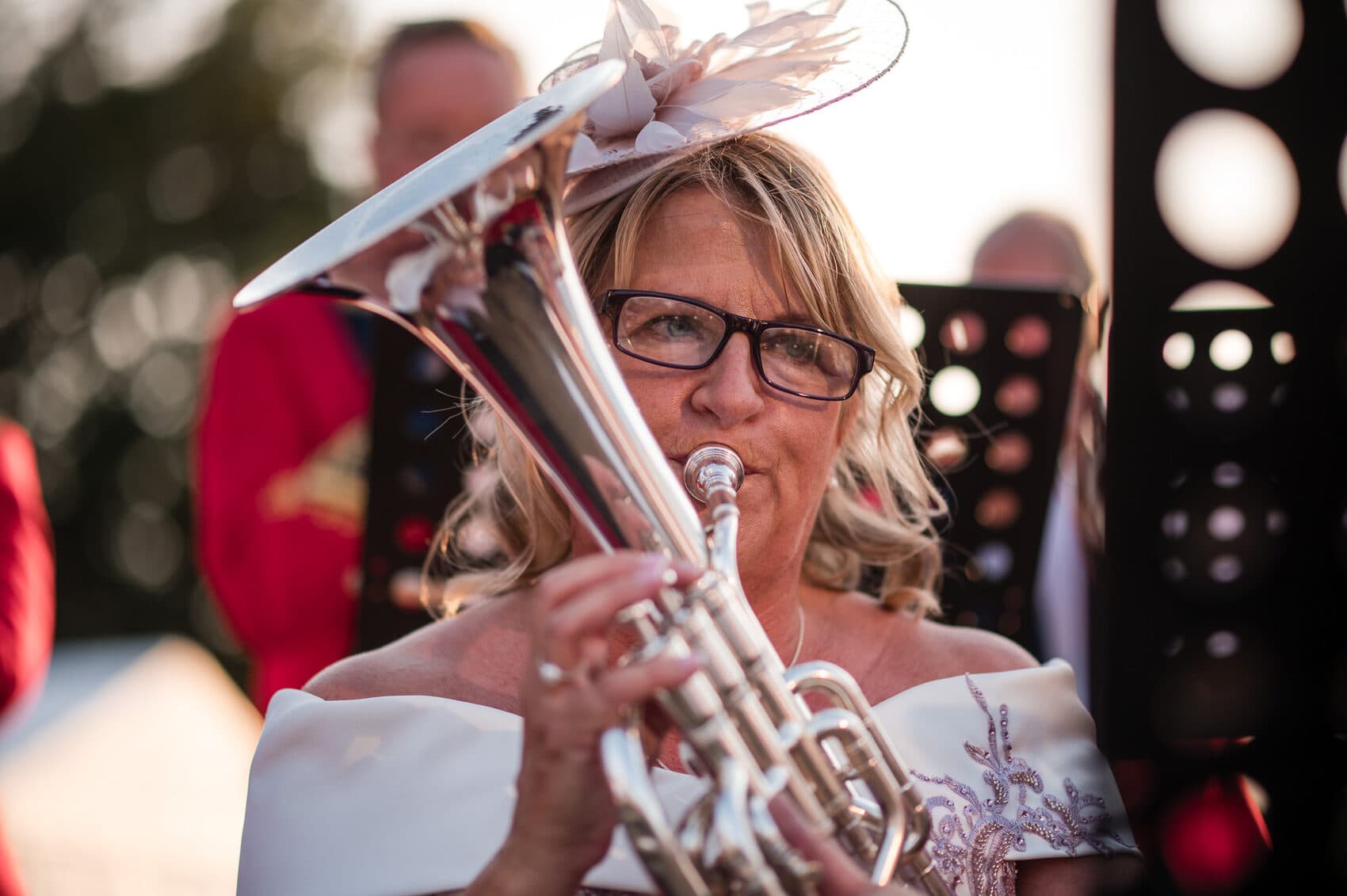 Mother of the bride playing a tuba