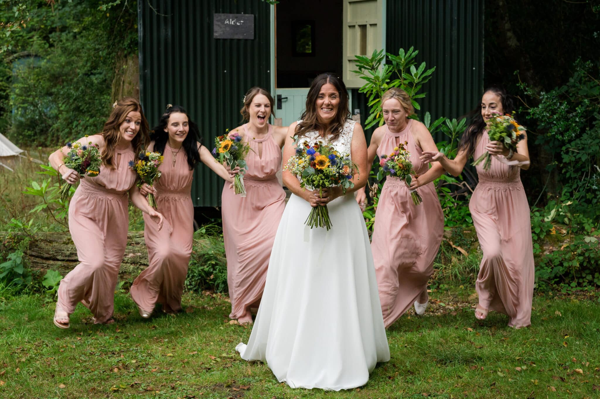 Bridesmaids have fun at Weddings in the Wood in the New Forest