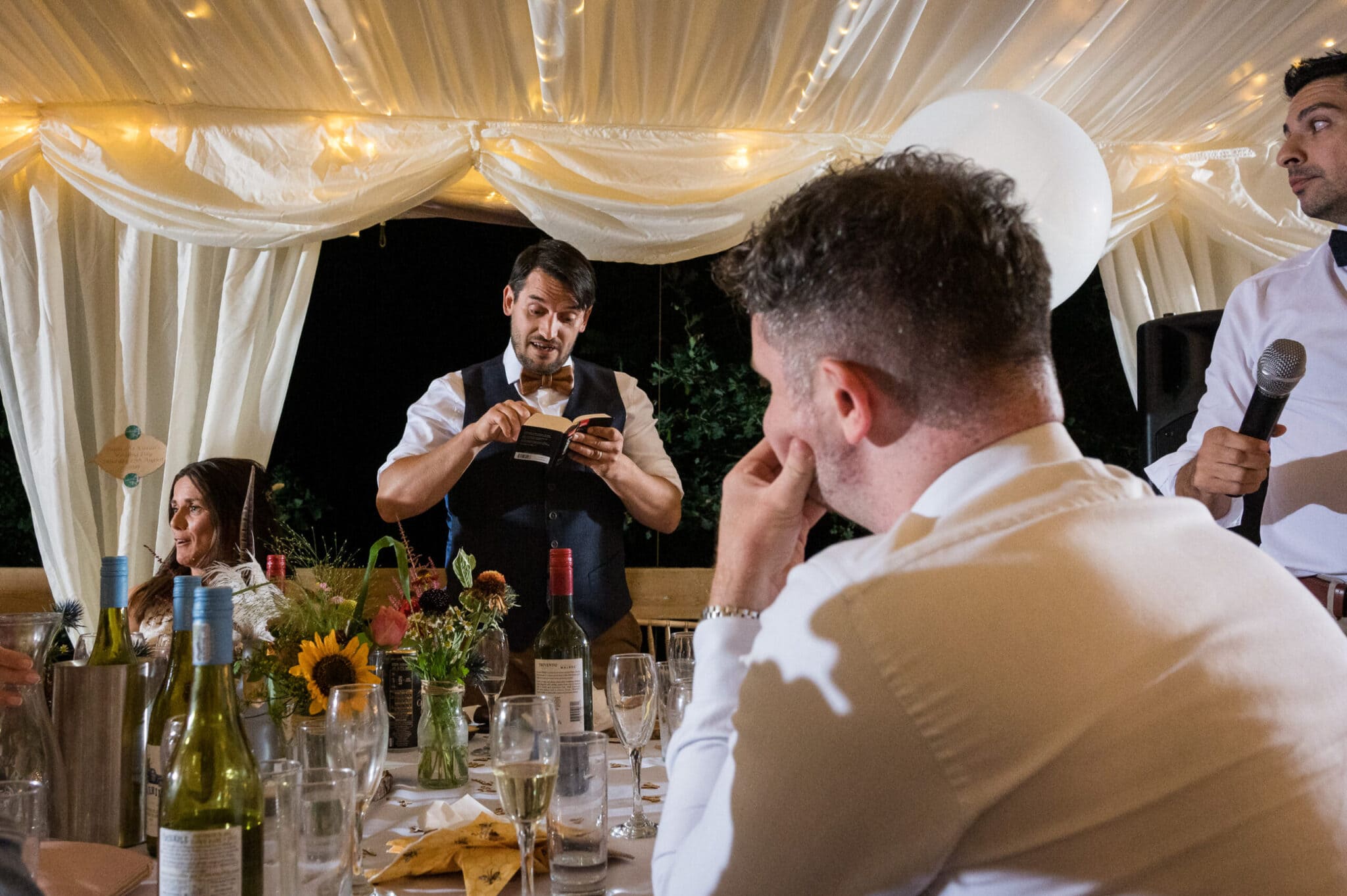 Groom checks diary in speech at Weddings in the Wood