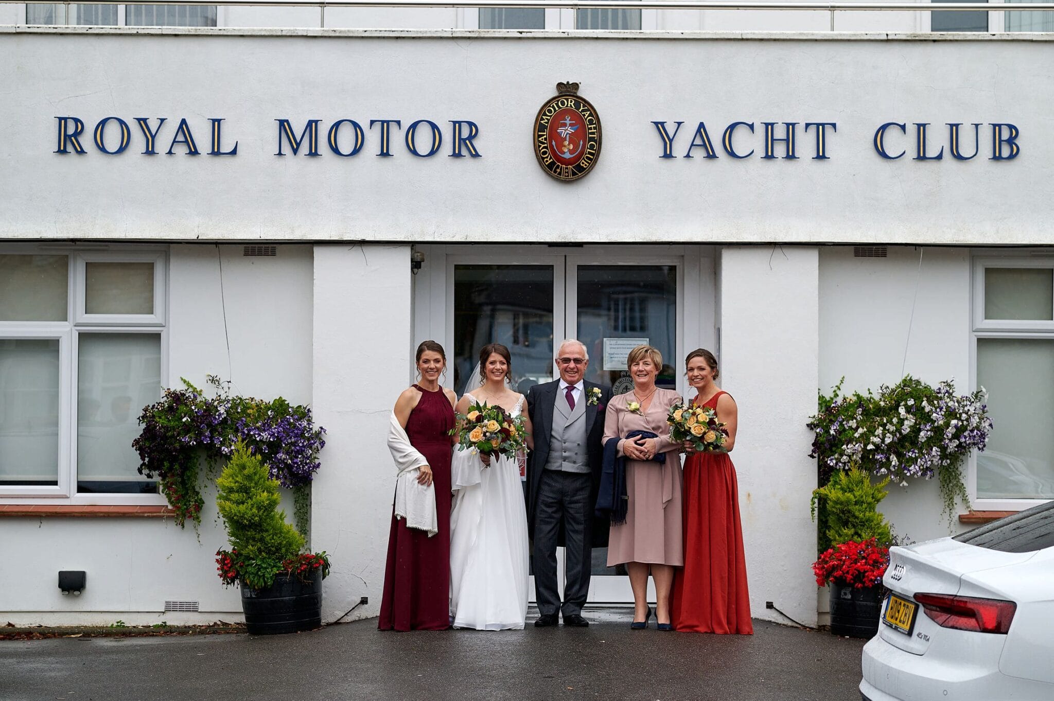 Wedding party outside the Royal Motor Club in Poole
