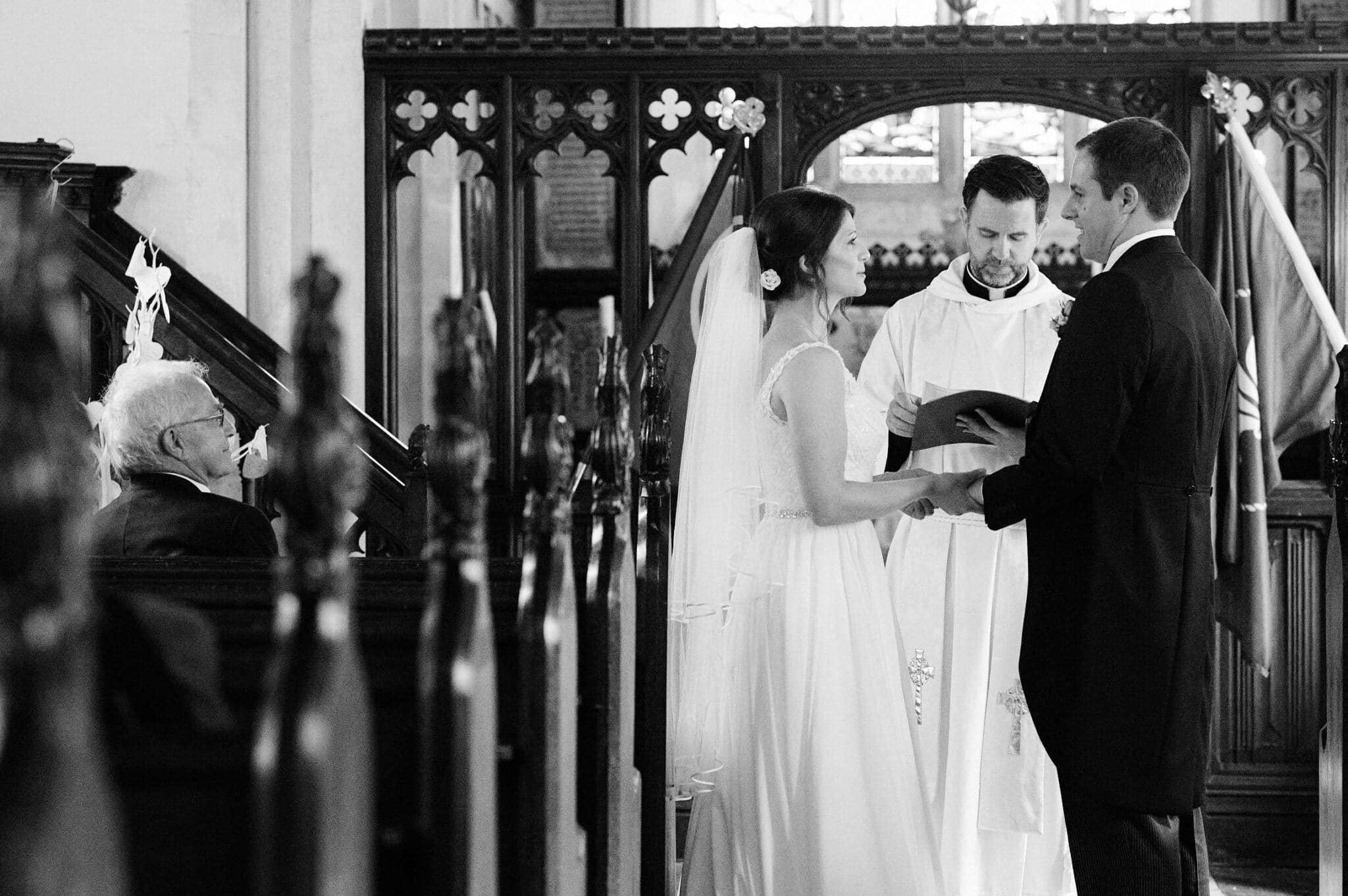 Saying vows at Brownsea Island Church wedding