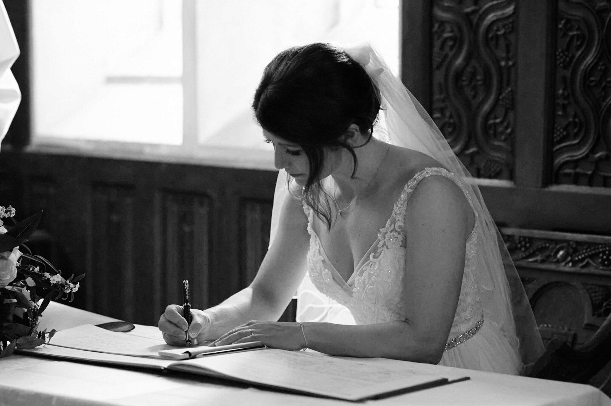 signing the register at Brownsea Island wedding