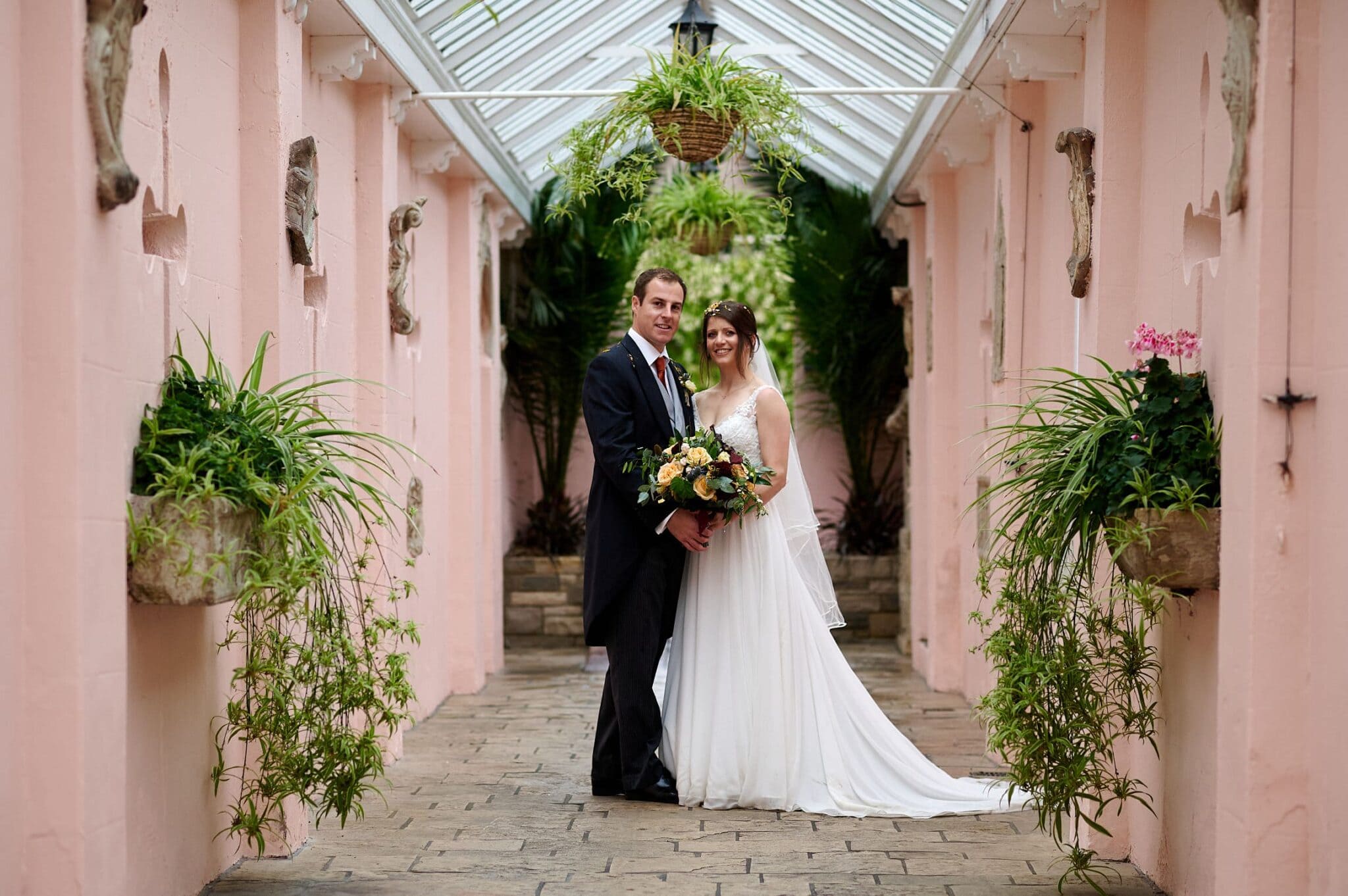 Bride and groom in Brownsea Island Castle entrance