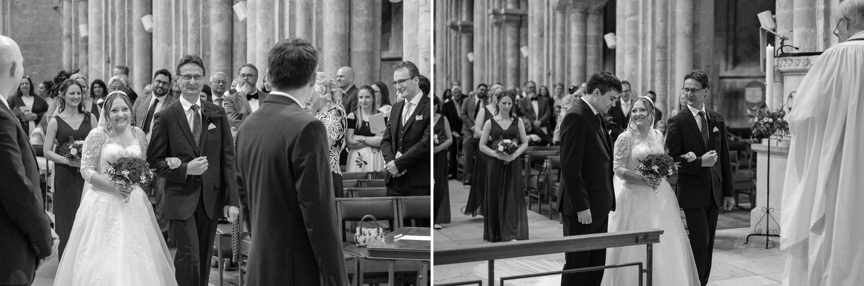 Bride walking the aisle at Christchurch Priory wedding ceremony