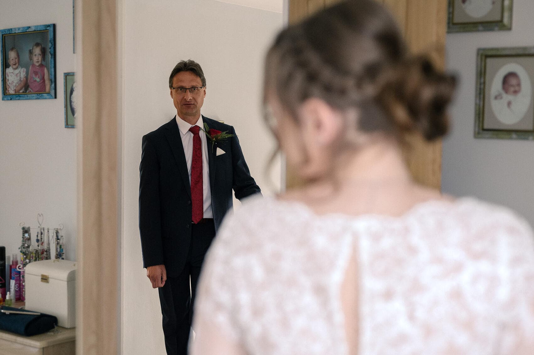 father of the bride sees his daughter in dress