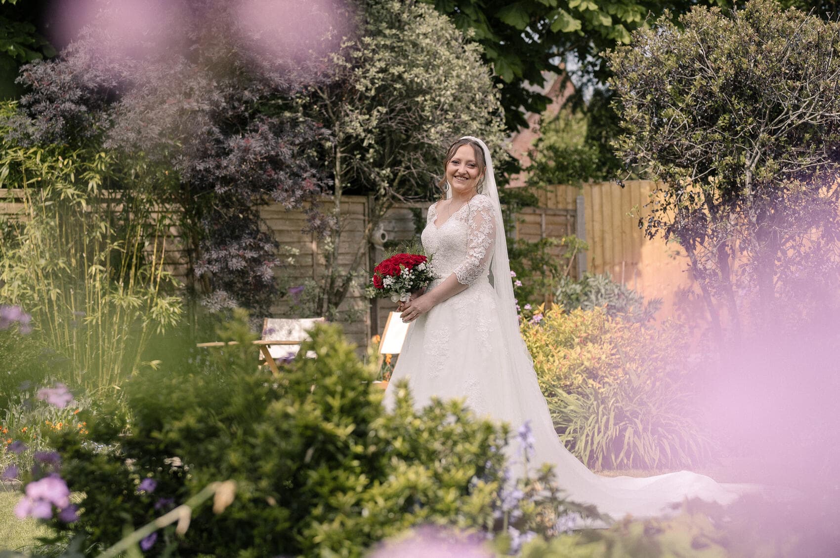 Bride in her garden at Highcliffe castle wedding