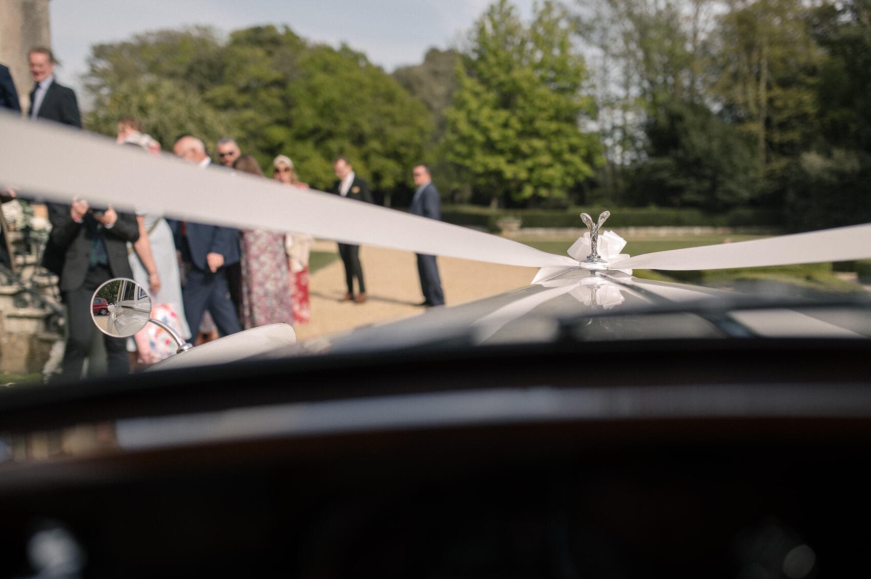 Car arriving at Highcliffe castle wedding