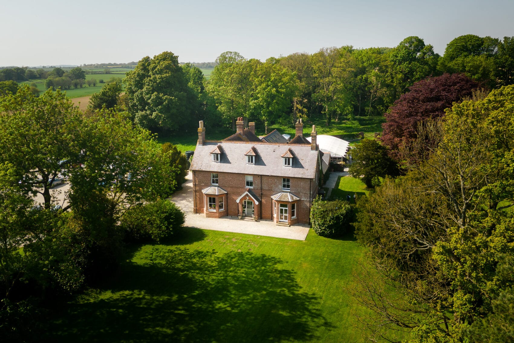 The front lawn and vieew of Abbots court from the air