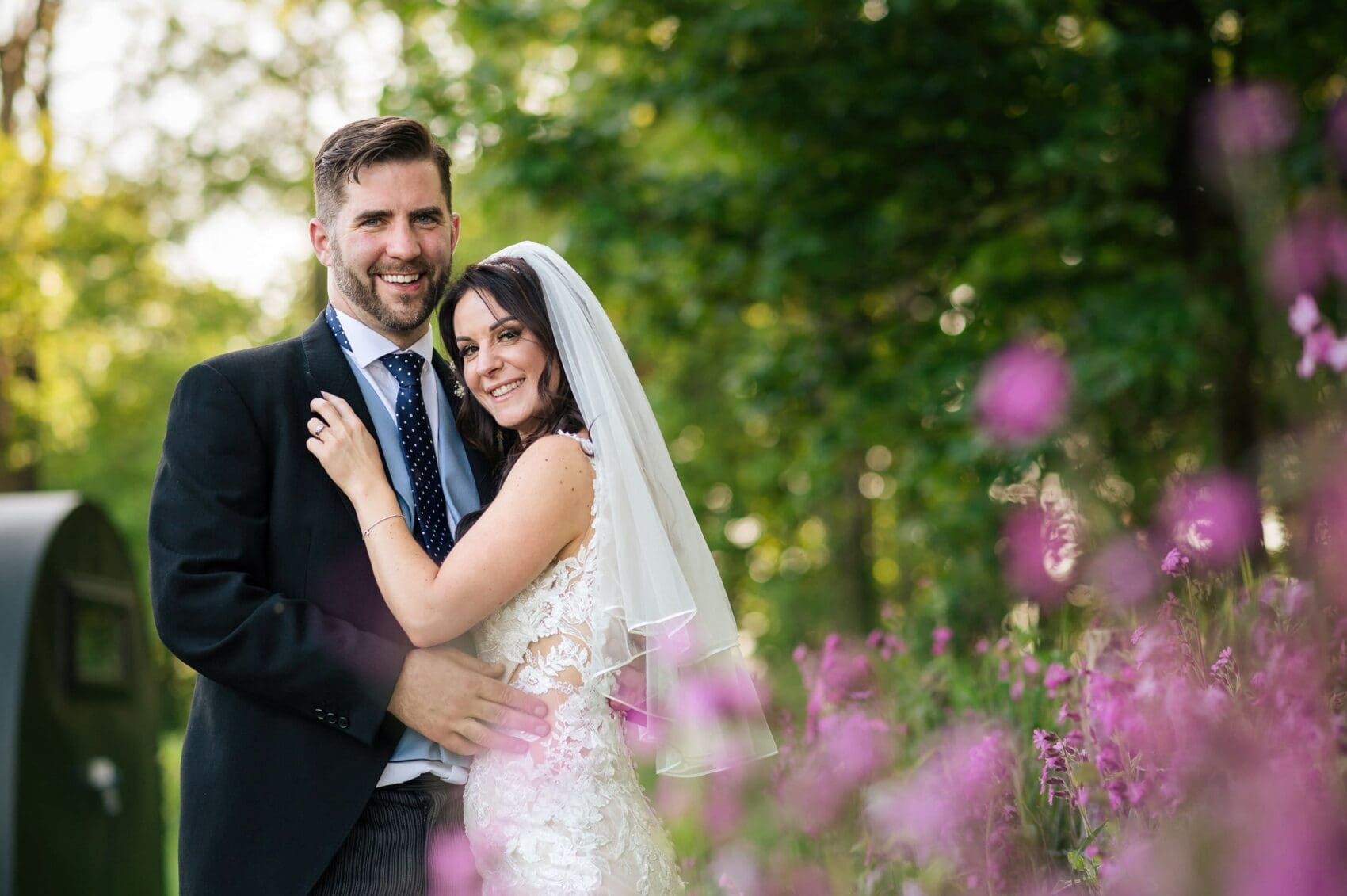Bride and Groom in the garden at Abbots Court