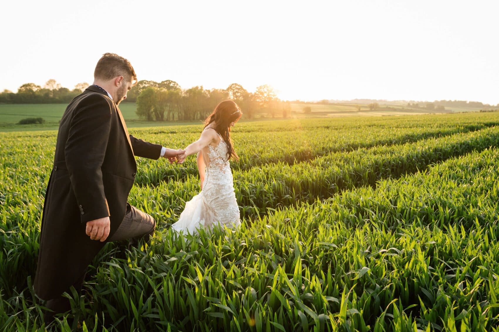 Golden hour portraits in the corn field at Abbots Court wedding
