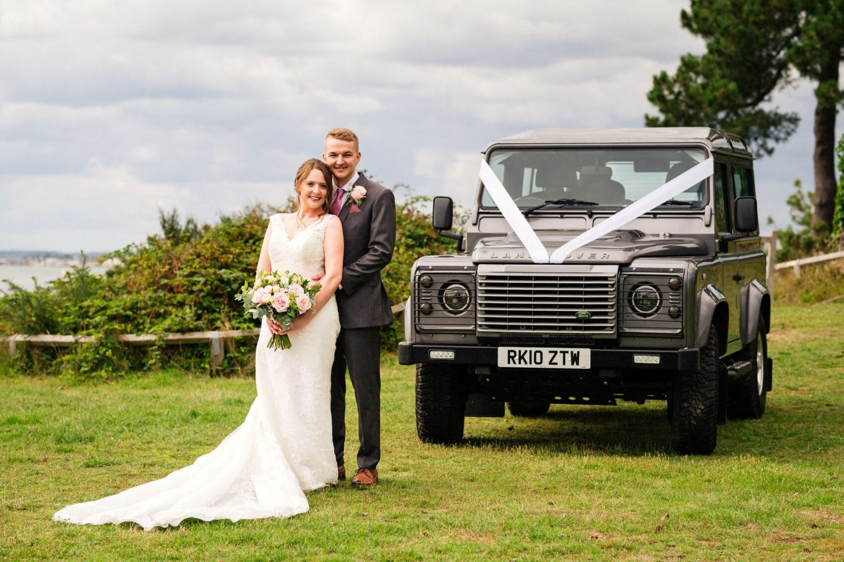 Bride and Groom with Land Rover Defender