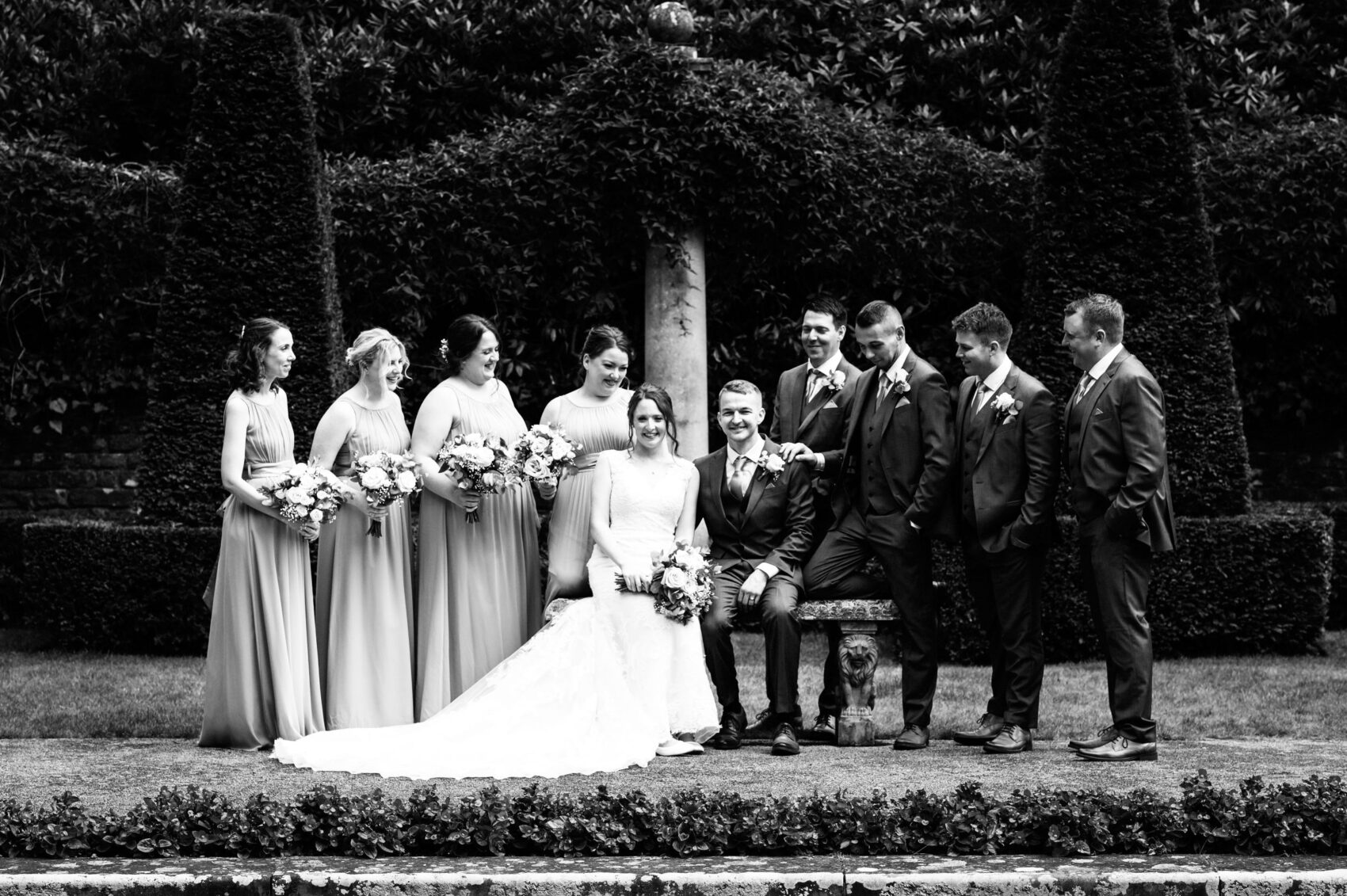 Bridal party pose together at The Italian Villa in Poole