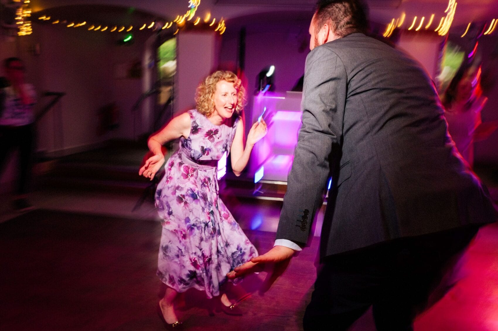 Mother of the bride shows her moves on the dance floor at The Italian Villa in Poole