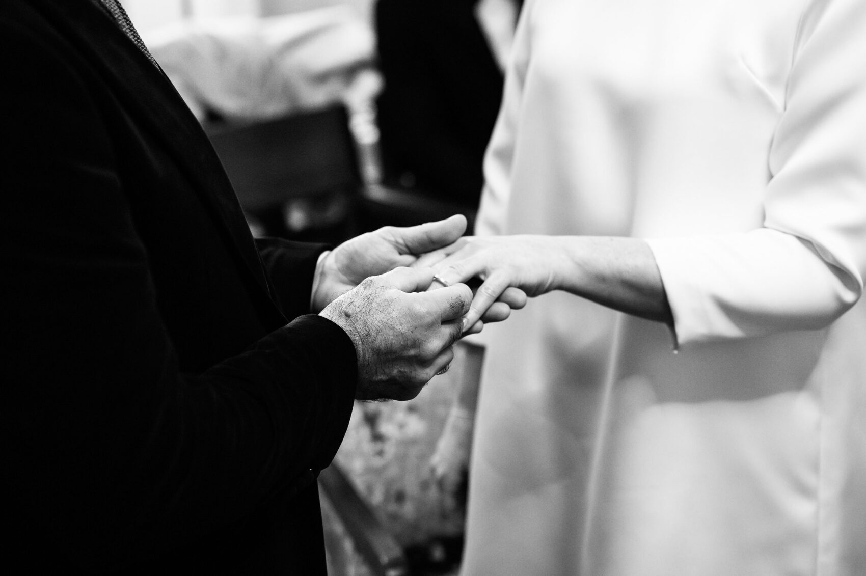 exchanging rings at Kensington and Chelsea Registry office wedding
