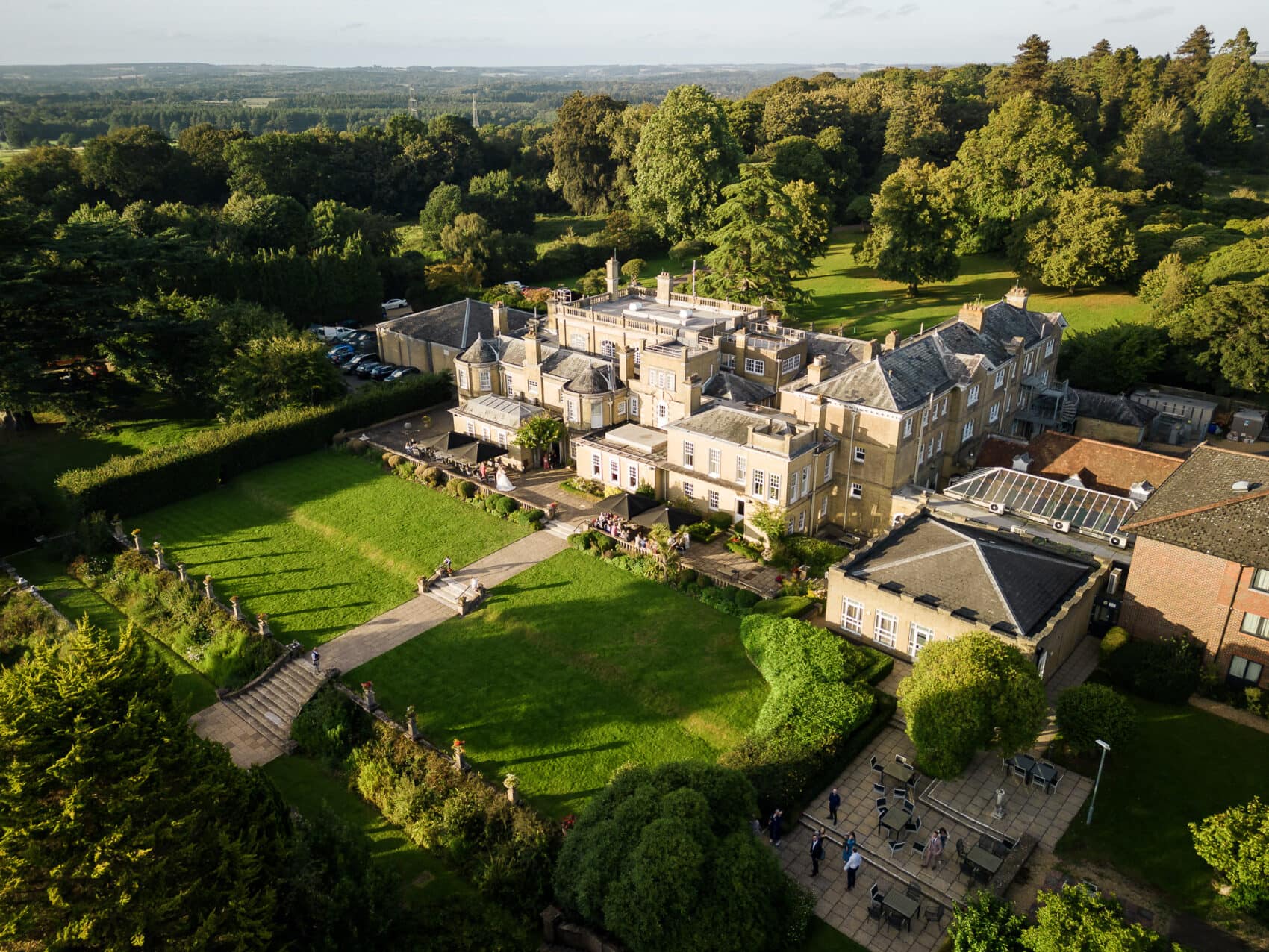 Chilworth Manor Hotel from the air in evening light