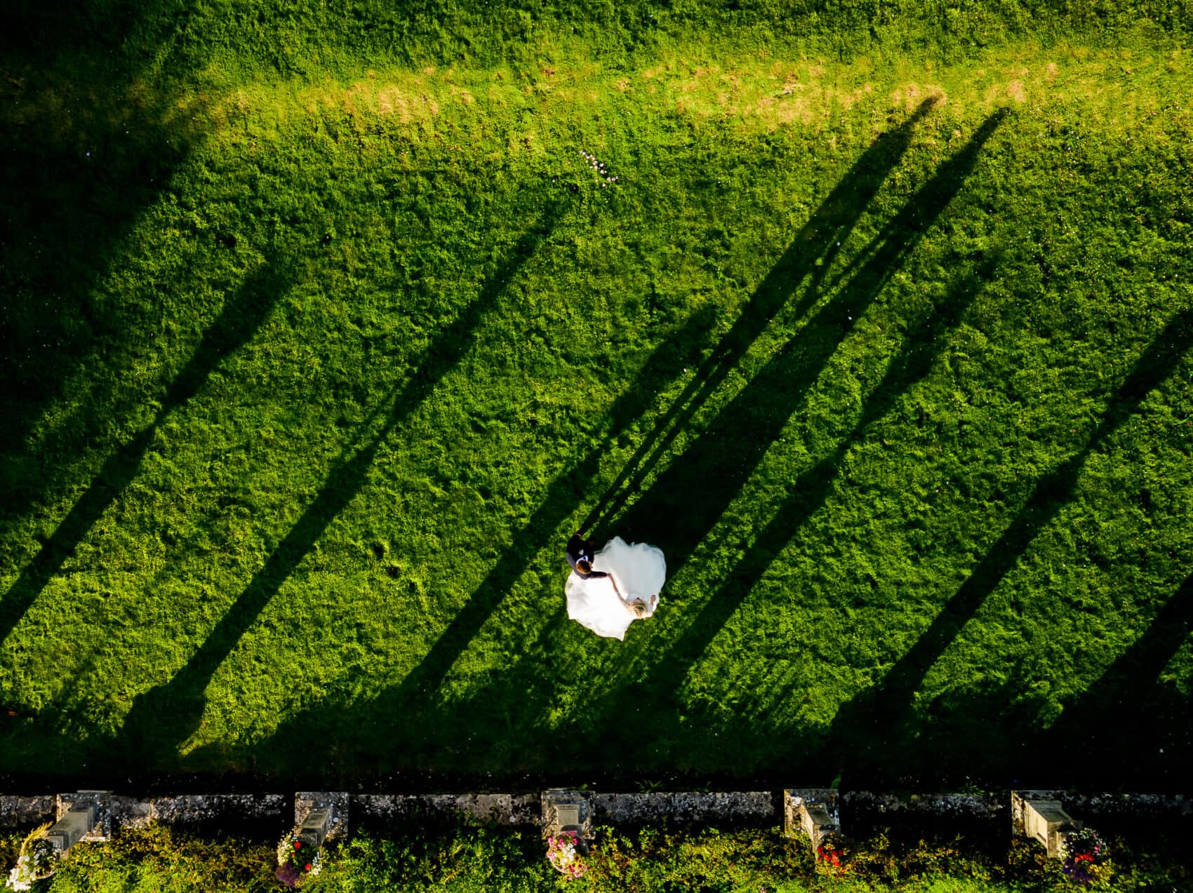 Long shadows on the Lawn at Chilworth Manor wedding