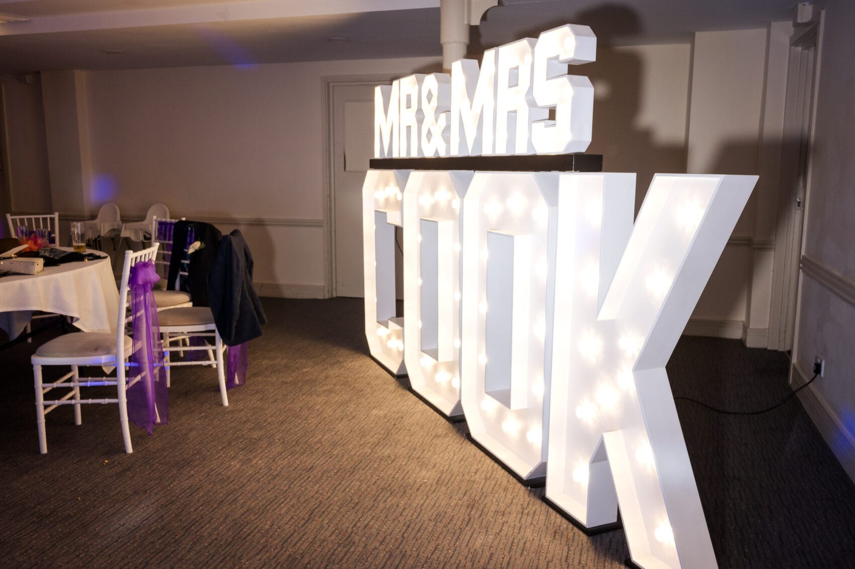 Mr & Mrs Cook sign at Chilworth Manor Hotel wedding