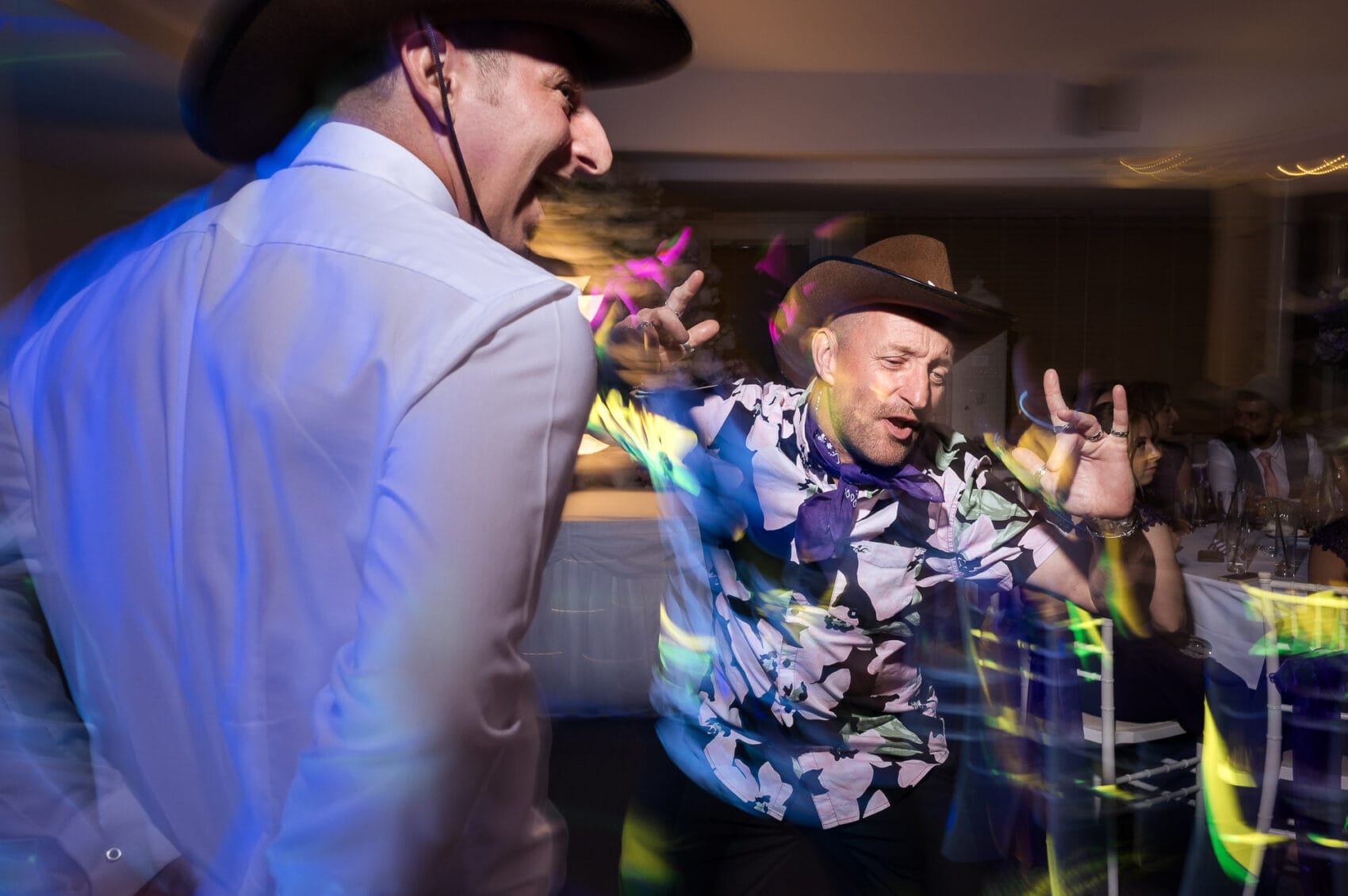 Wedding dancefloor action with cowboy hats