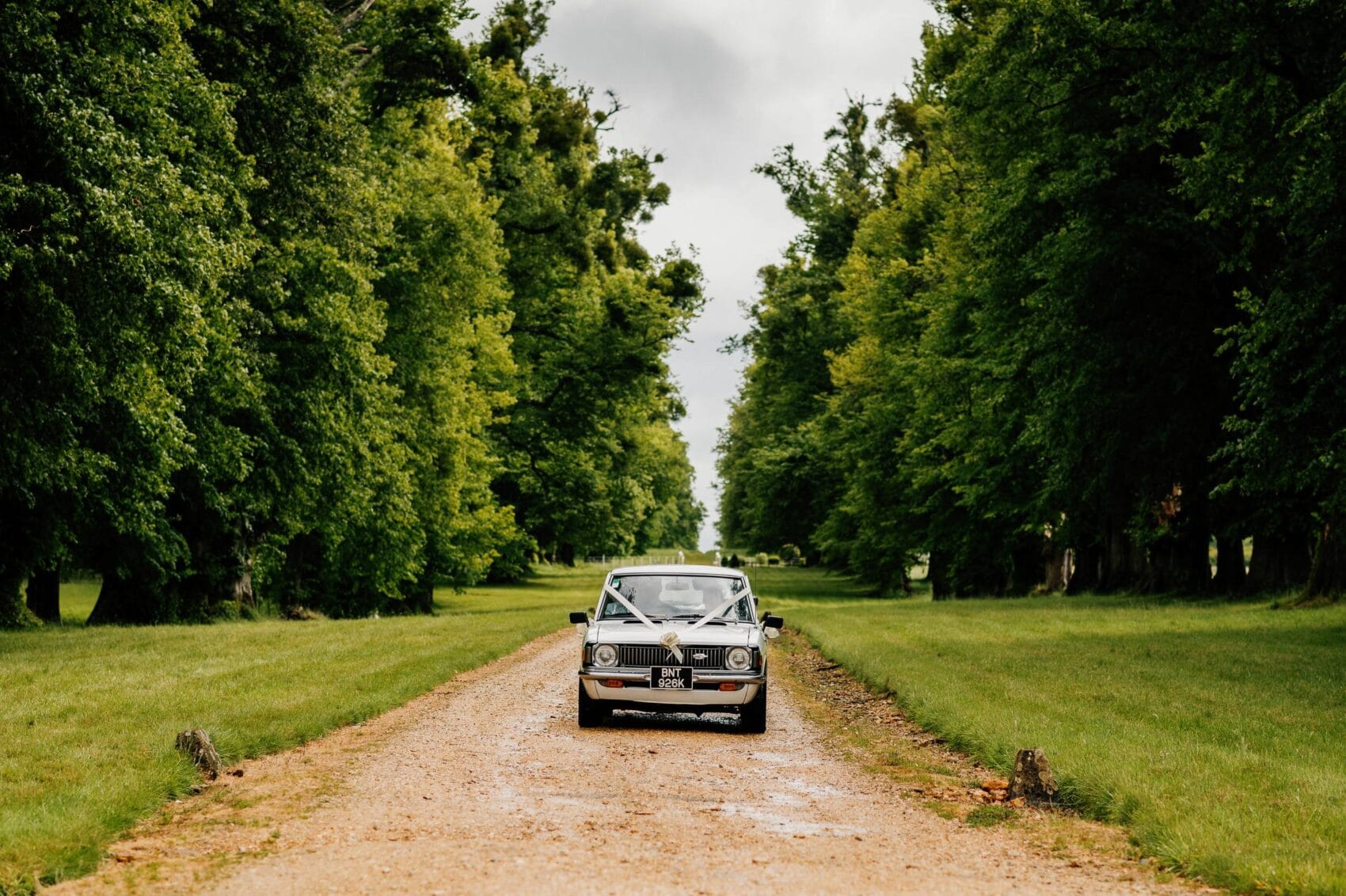 Groom arrives at Hale Park House Wedding