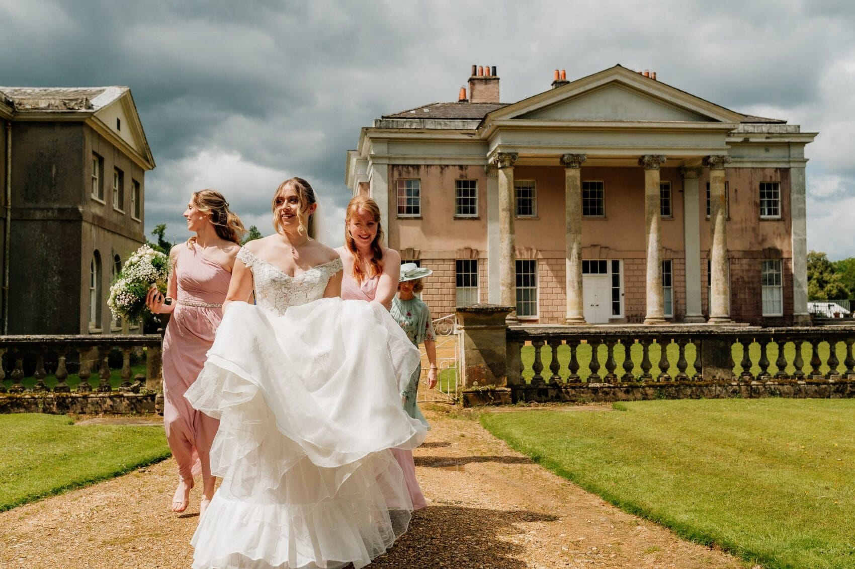 Bride trabe walk by the front of Halk Park House