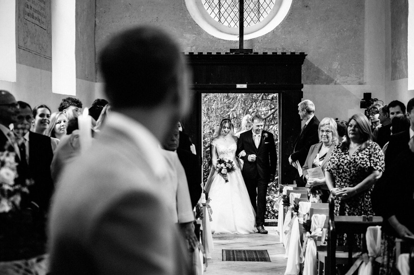 Bride enter church at Hale Park House