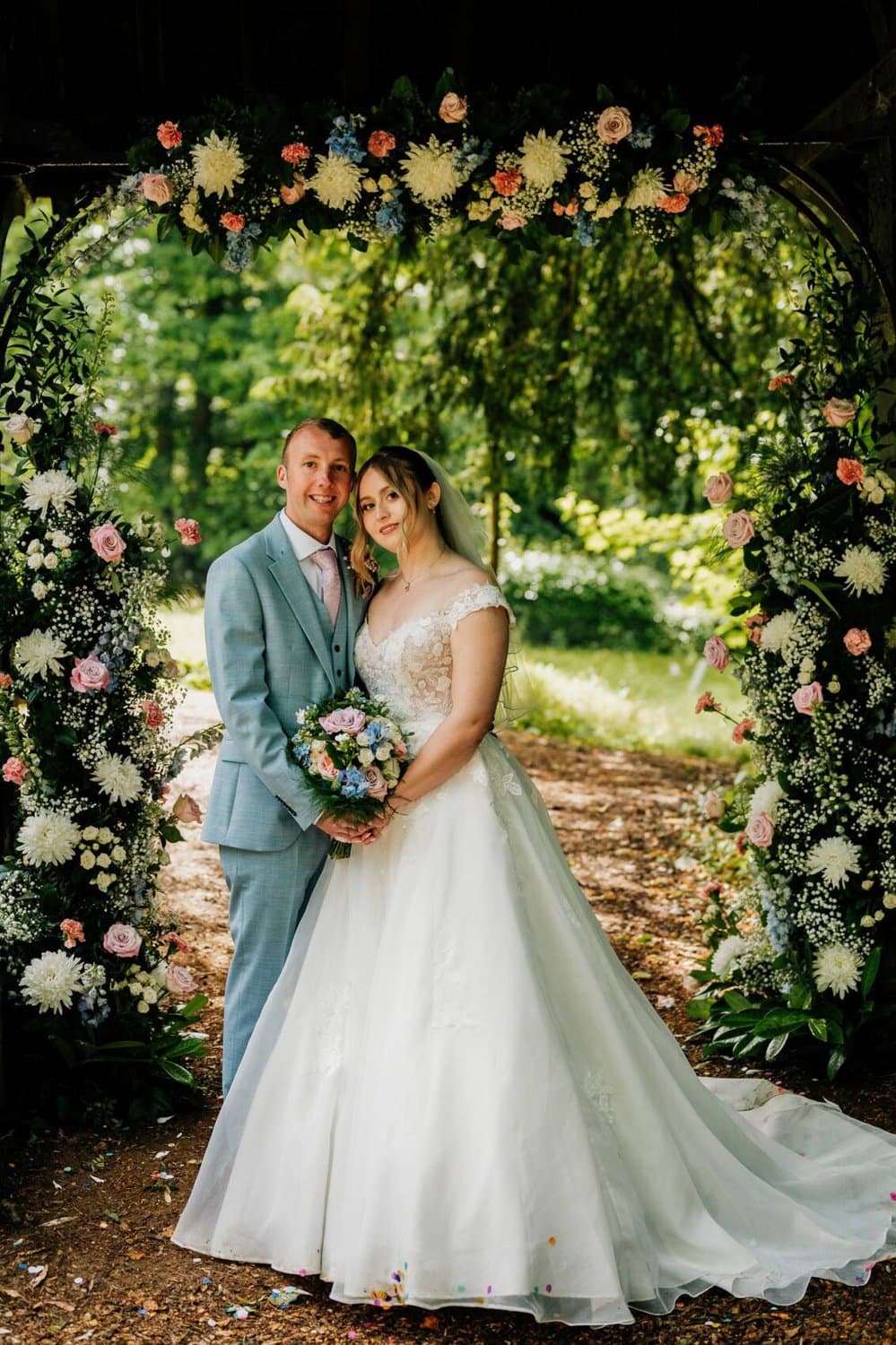 Flower arch outside church at Hale Park House Wedding