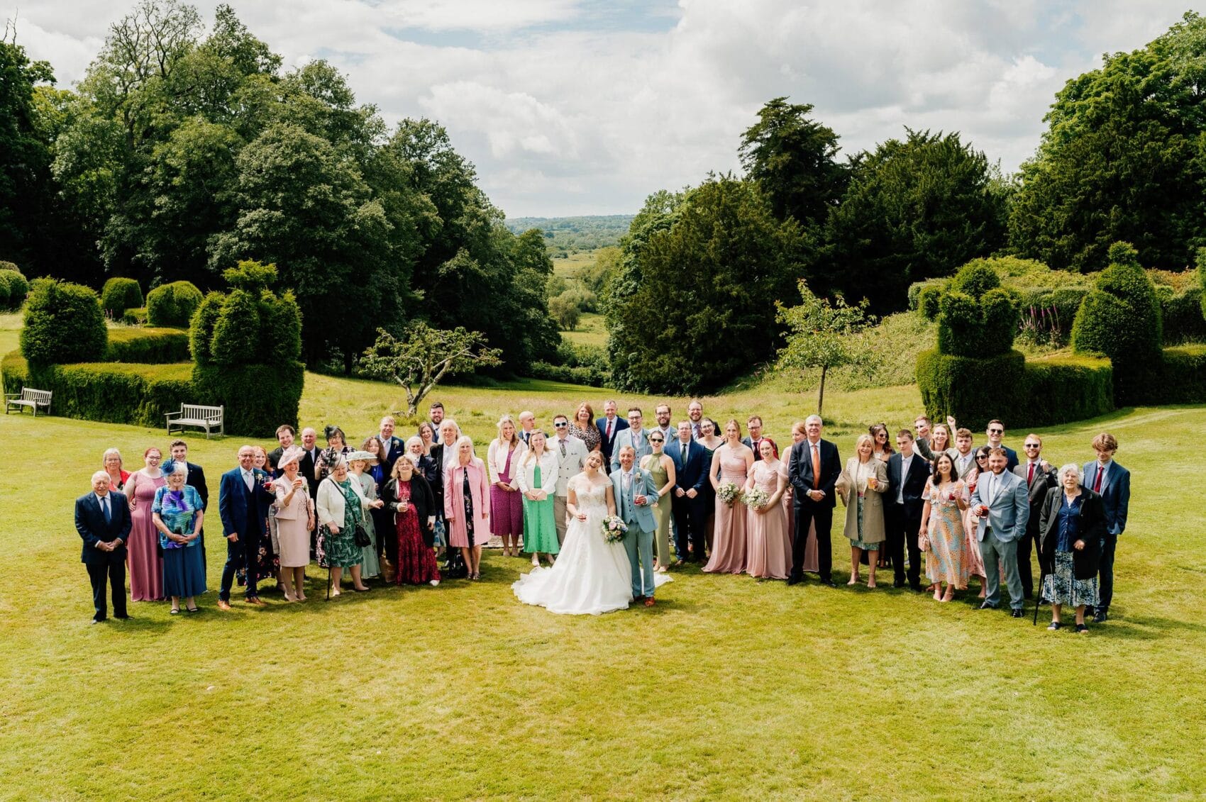 Group photo on the lawn at Hale Park House Wedding