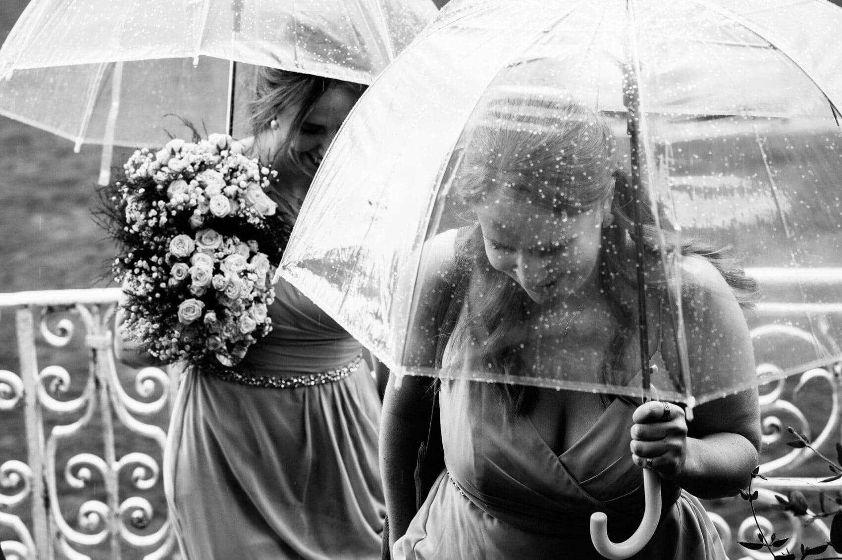 bridemaids un umbrella at Hale Park House Wedding