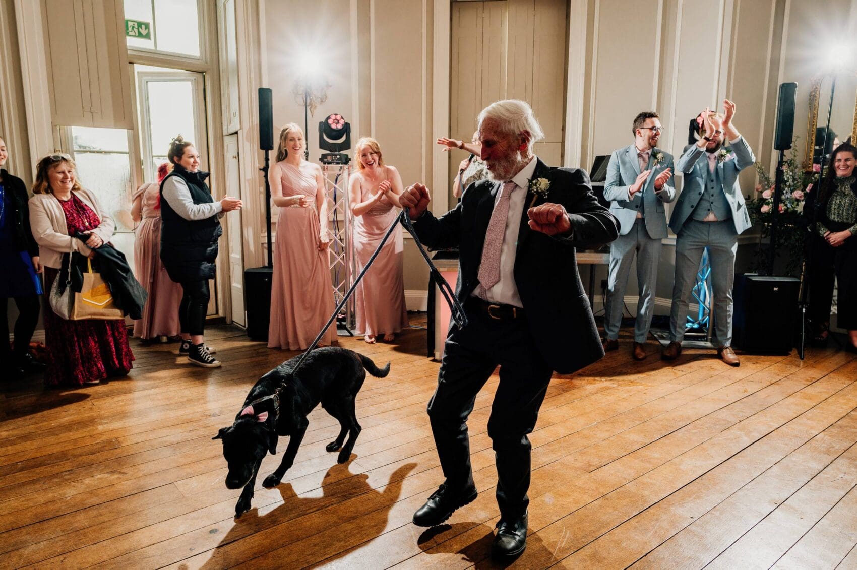 grandfather and dog on the dancefloor at Hale Park House Wedding