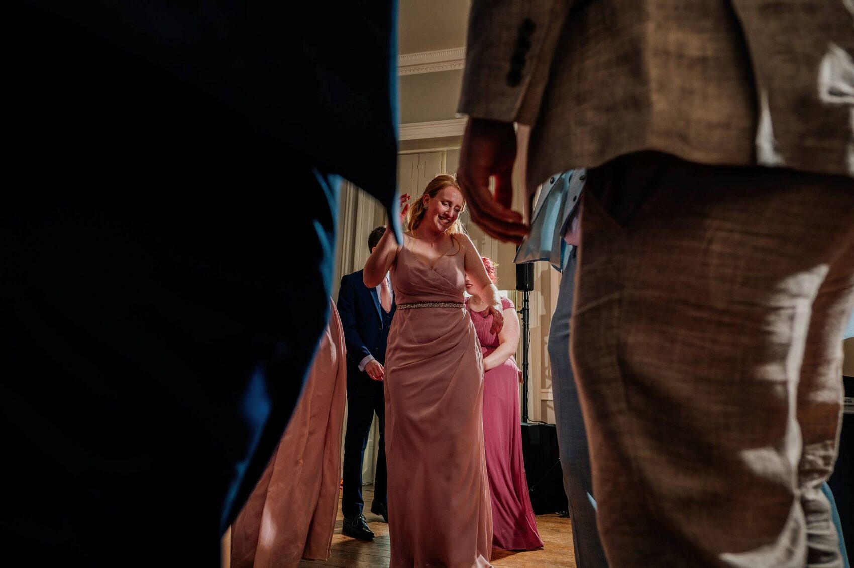 bridemaid dancing at Hale Park House Wedding