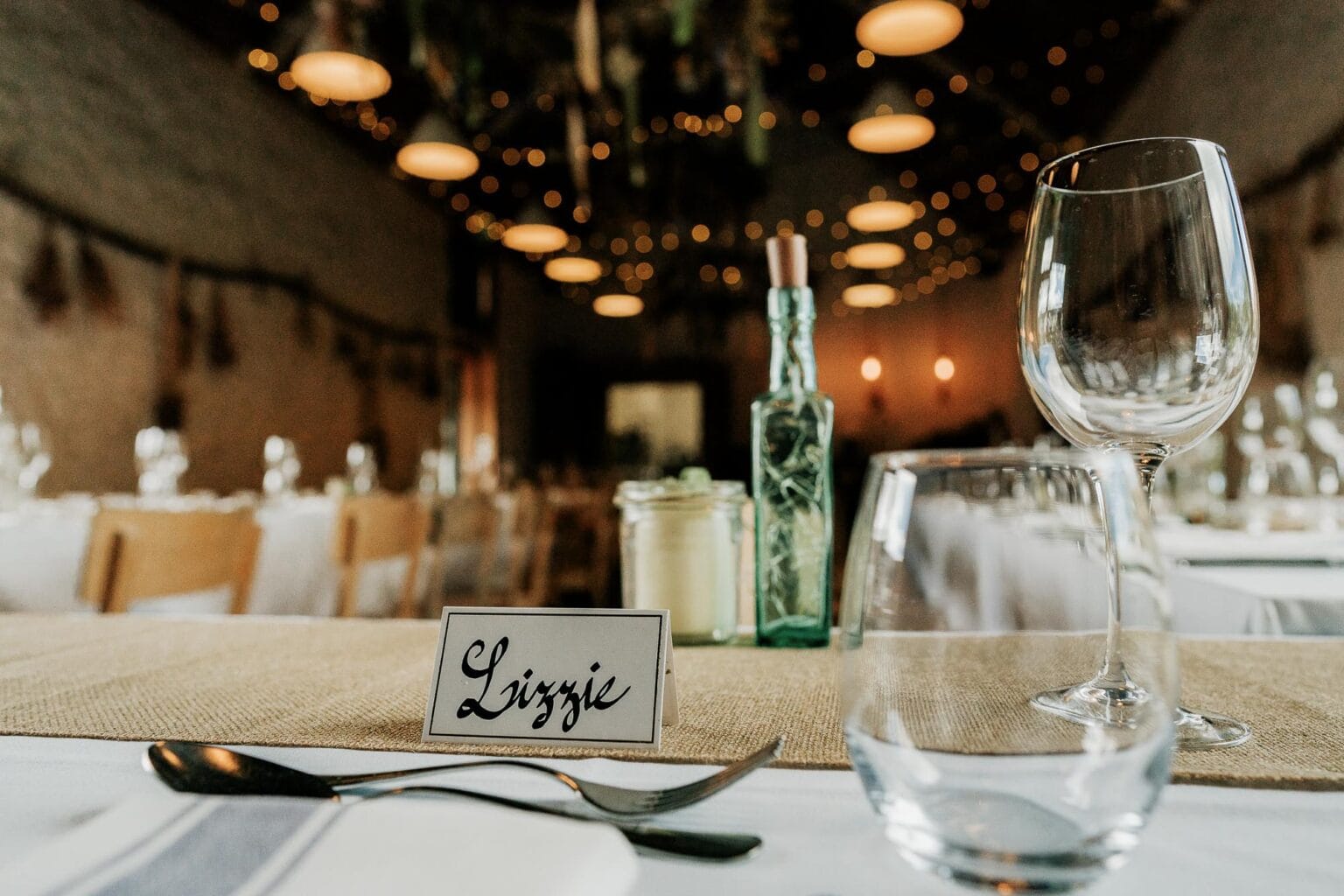 Brides place setting in the barn at River cottage