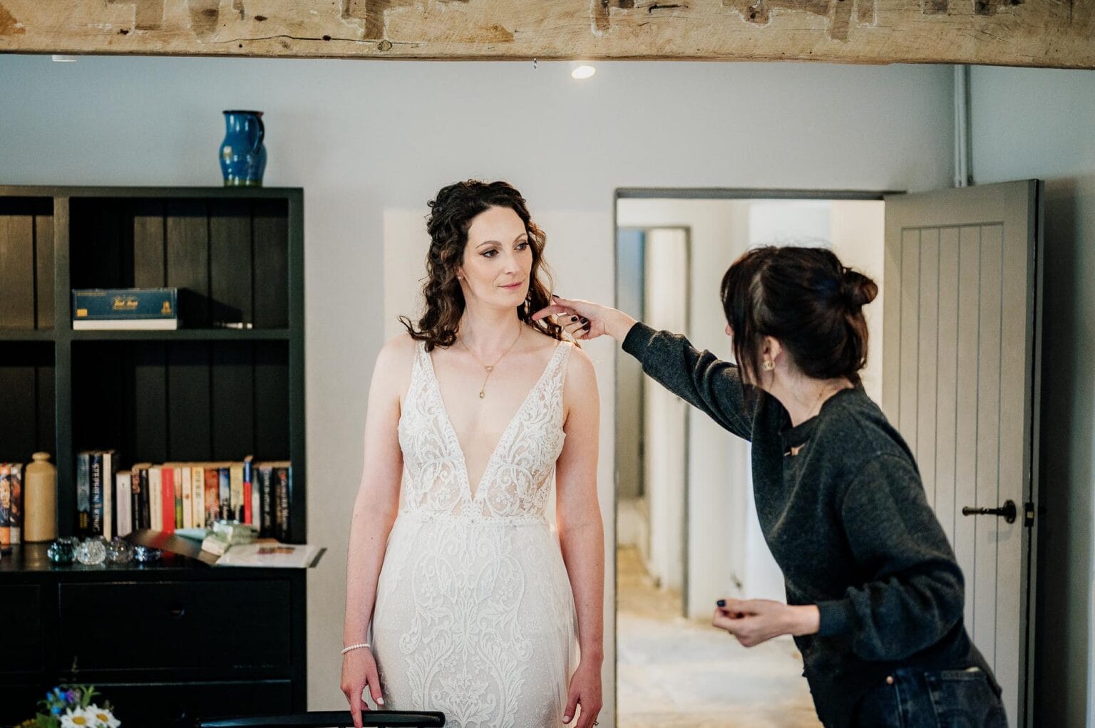 Final touches to the brides hair at River Cottage wedding