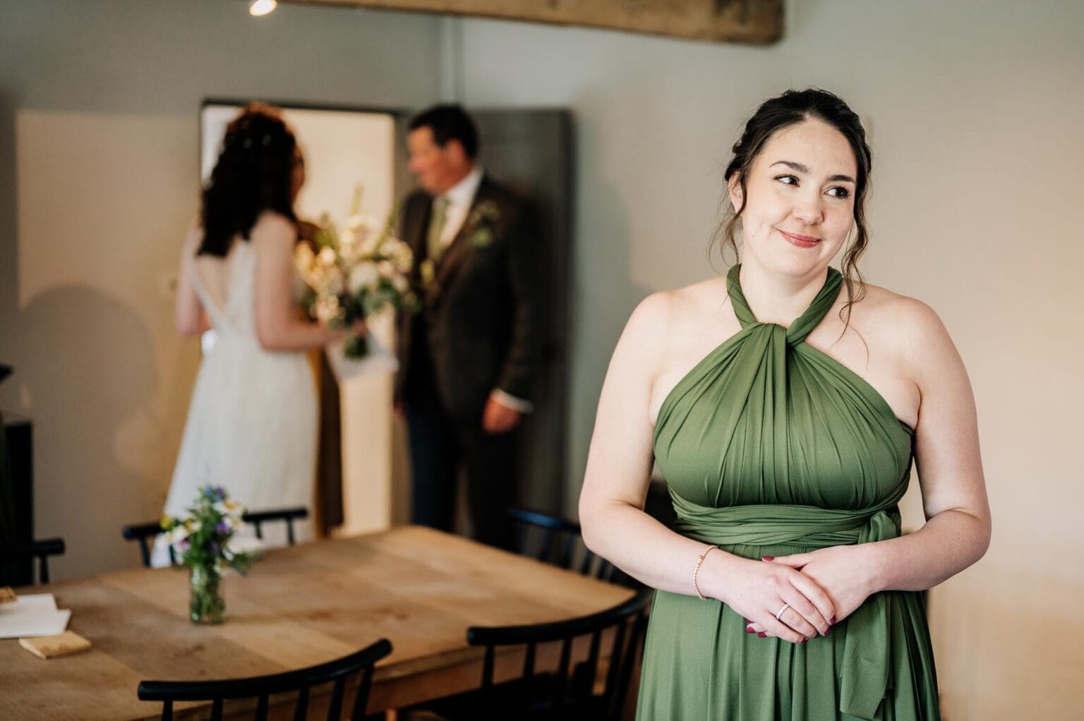 Bridesmaid holds back some tears at River Cottage wedding