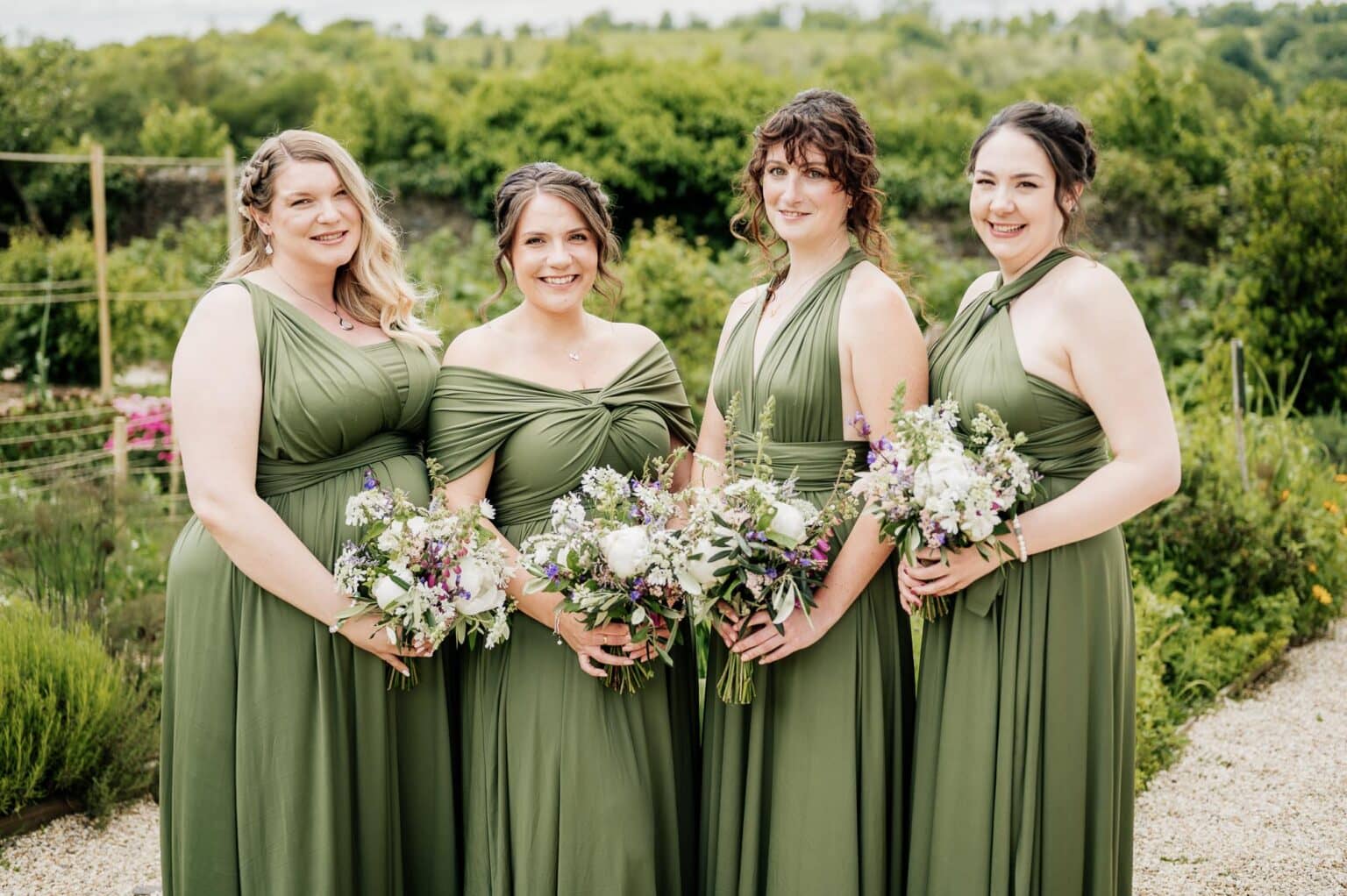 Bridesmaids dressed in green drersses at River Cottage wedding