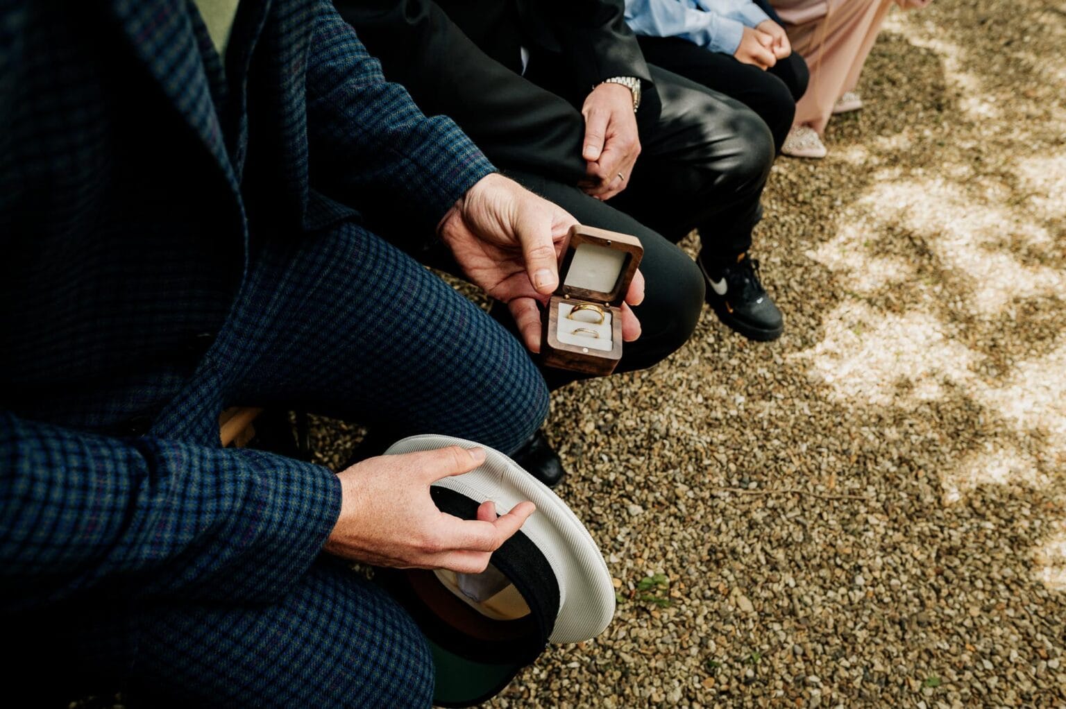 bestman holds the rings at River Cottage garden wedding