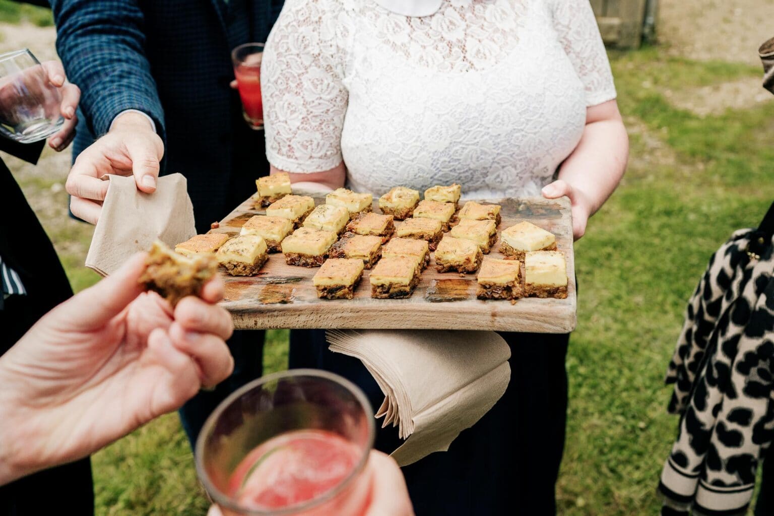 serving the south african food at River Cottage garden wedding