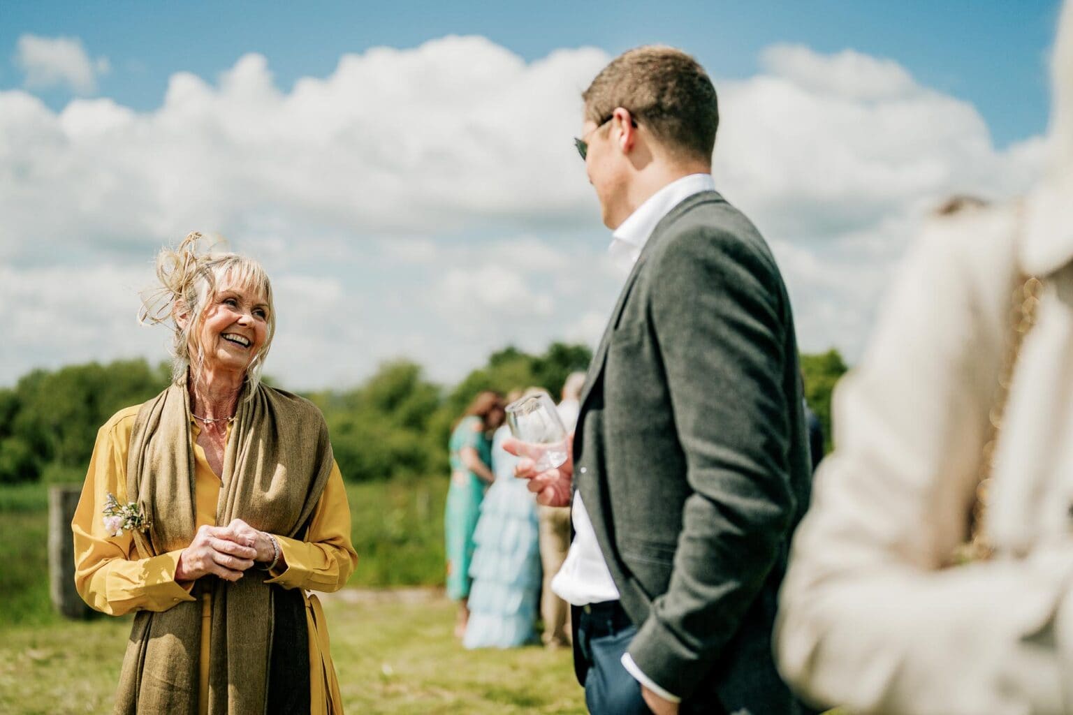 Geusts laughing at River Cottage garden wedding