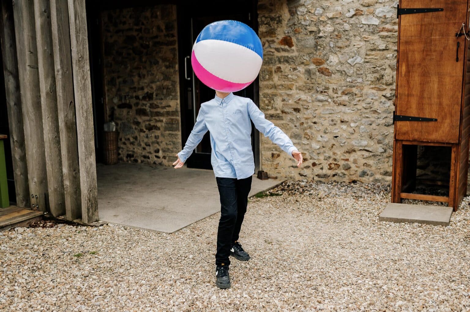 Ball falls in front of boys head at River cottage HQ wedding