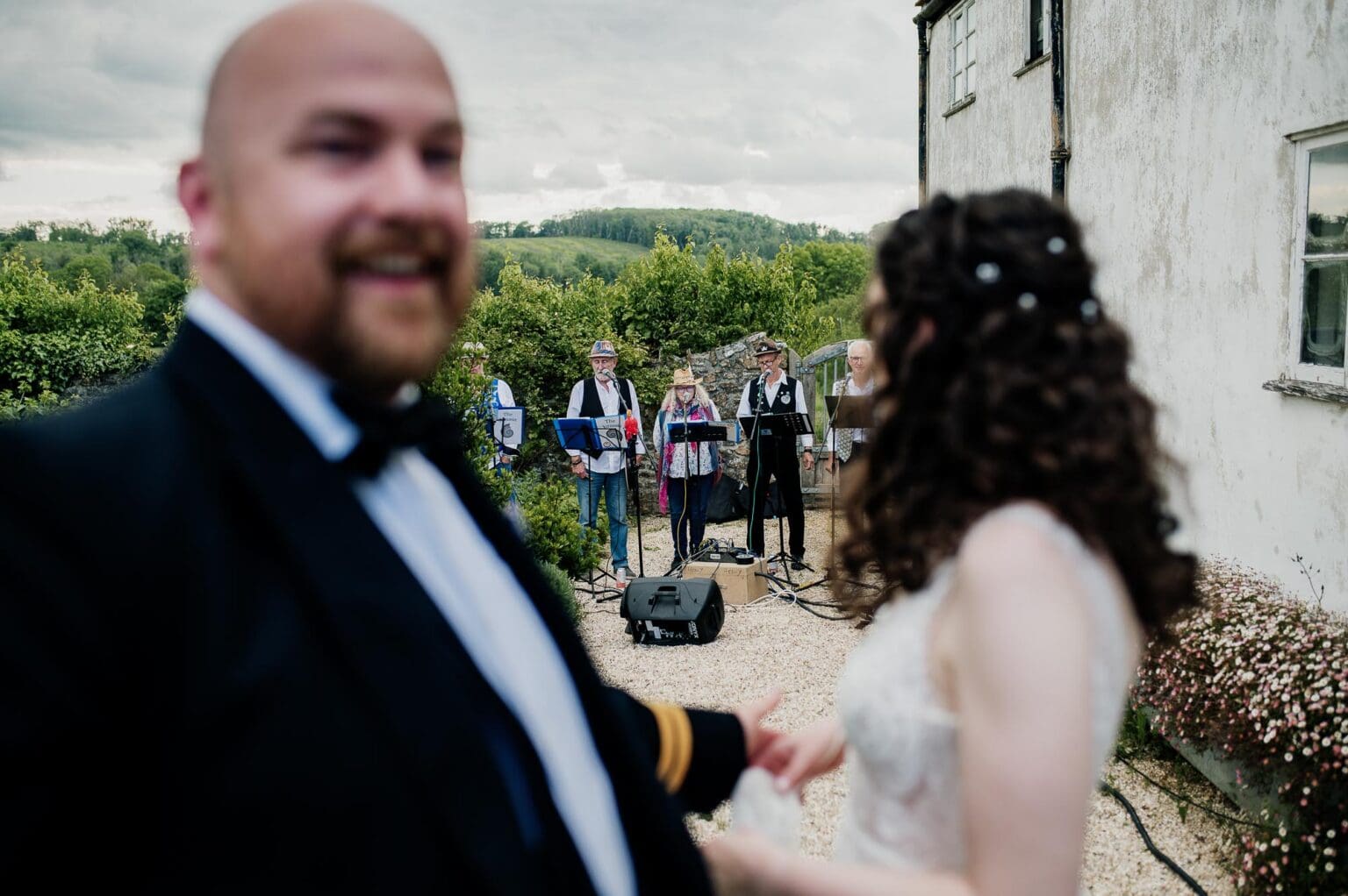 Groom receives a surprise Sea Shany band at River cottage HQ wedding