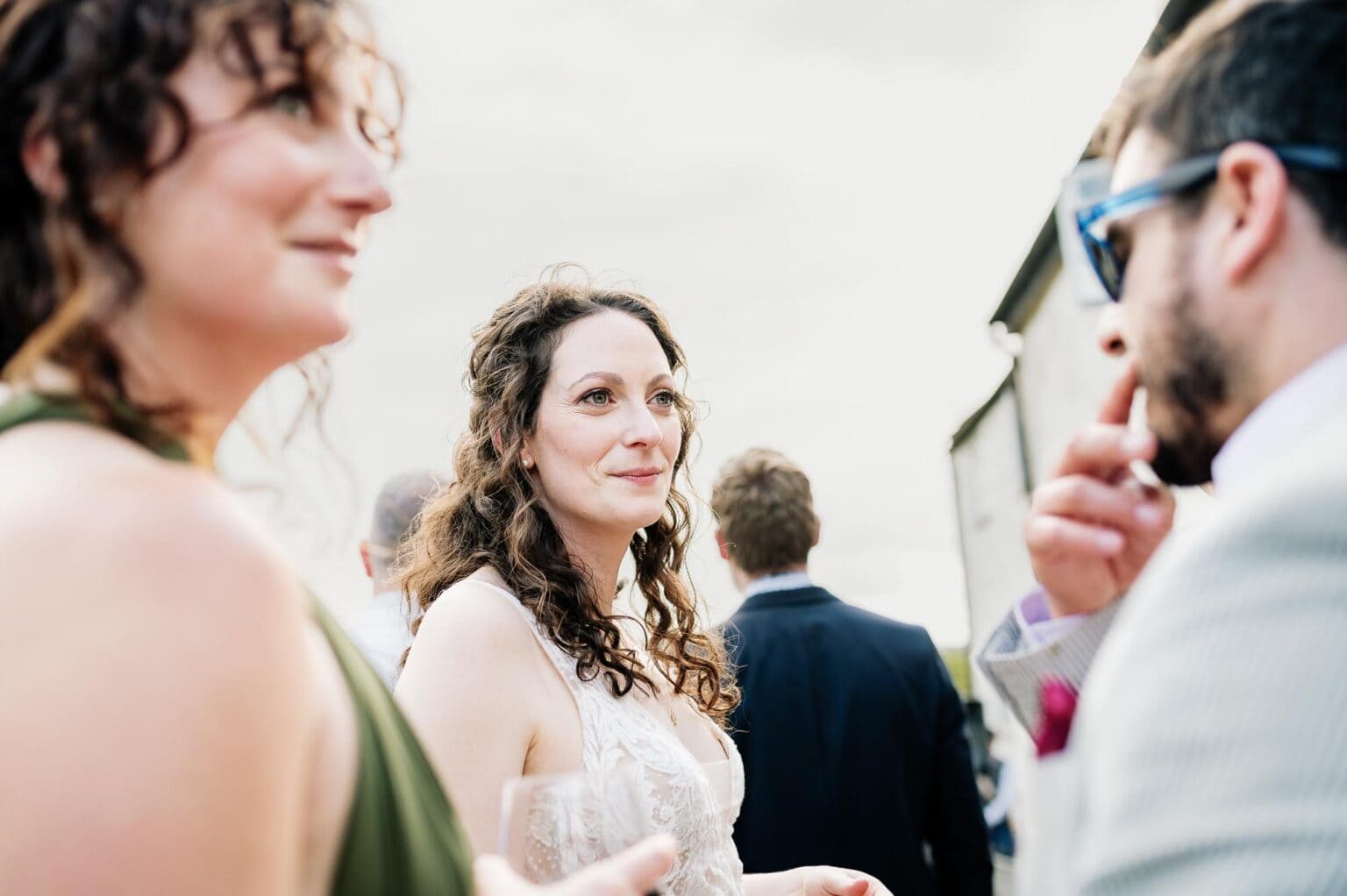 Guests and the bride looking happy at River cottage HQ wedding