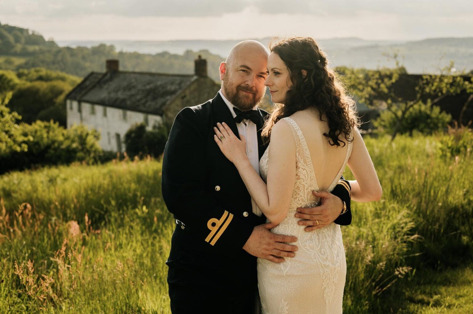 a view over the cottage with the bride and groom at River cottage HQ wedding