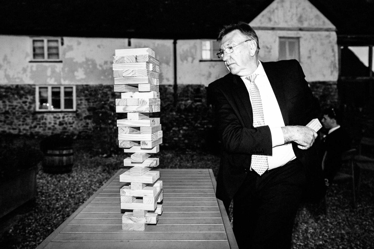 Guest playing jenga in the dark